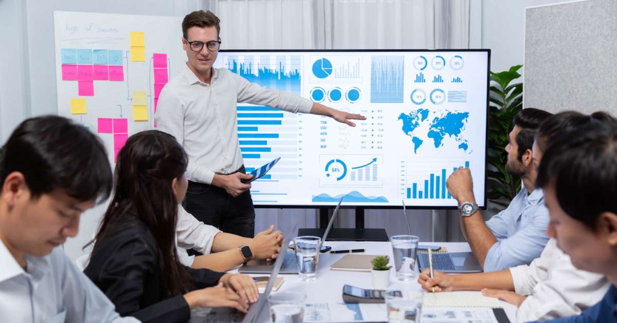 Strategic Marketing Services | Marketing Planning Services | Coworkers Around Whiteboard