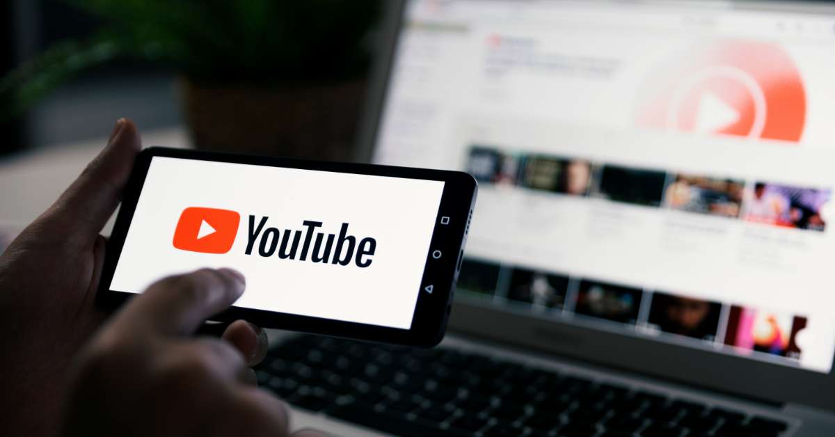 YouTube logo displayed on phone screen