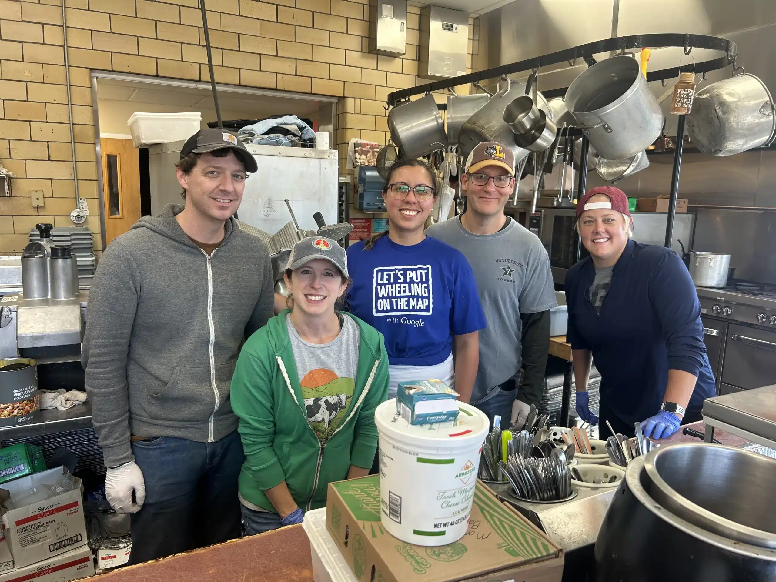 An Agency that Cares | 5 DOM team members at The Wheeling Soup Kitchen