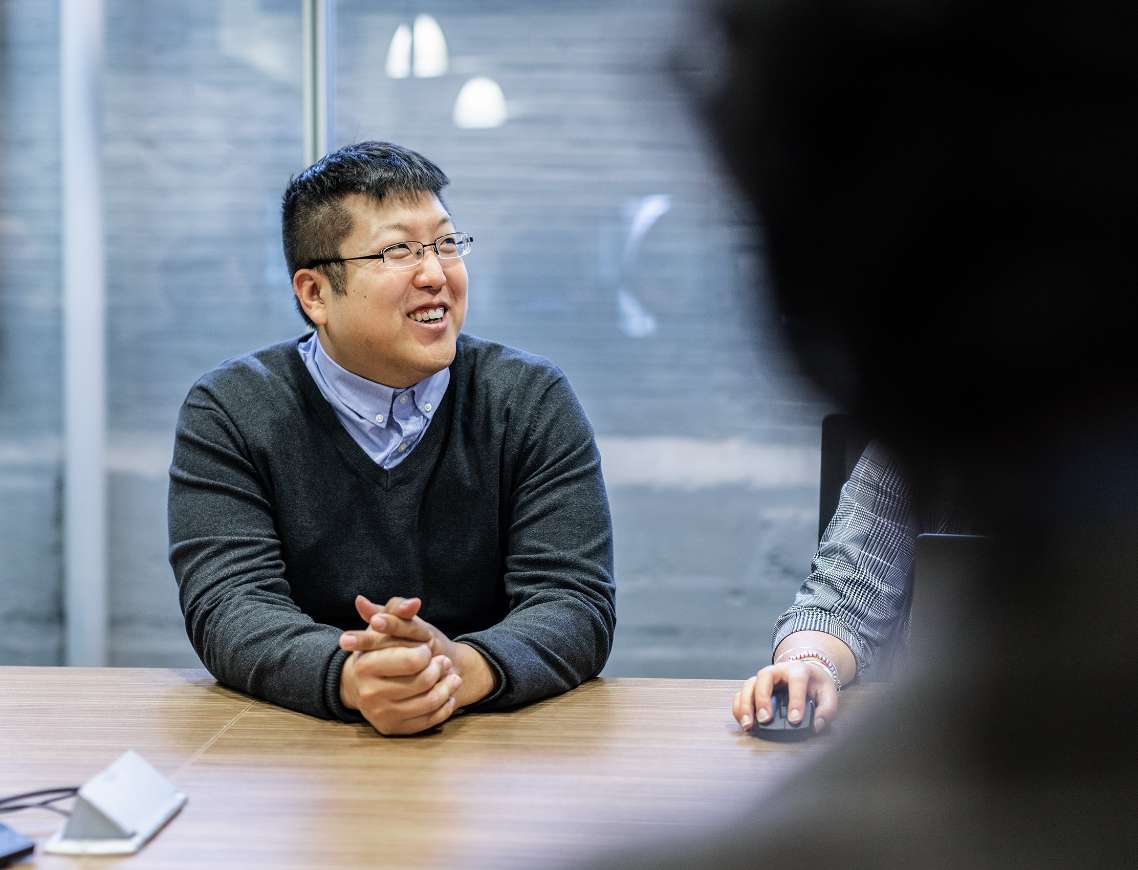 Pittsburgh Employee Smiling during meeting