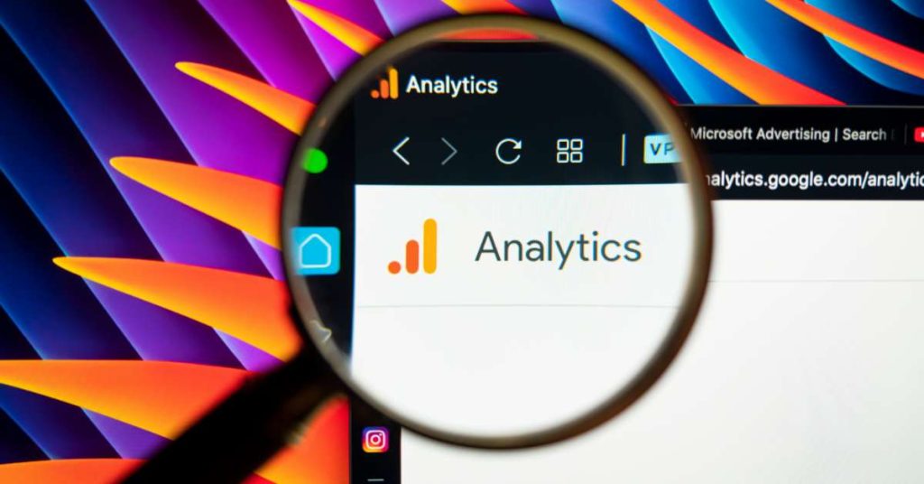 Magnifying glass highlighting Google Analytics logo